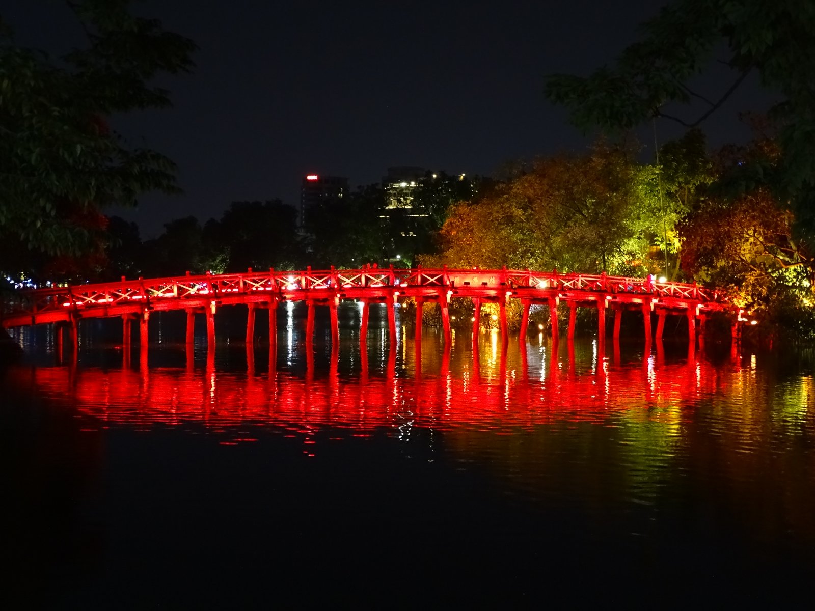 The red bridge over Hoan Kiem Lake illuminated at night